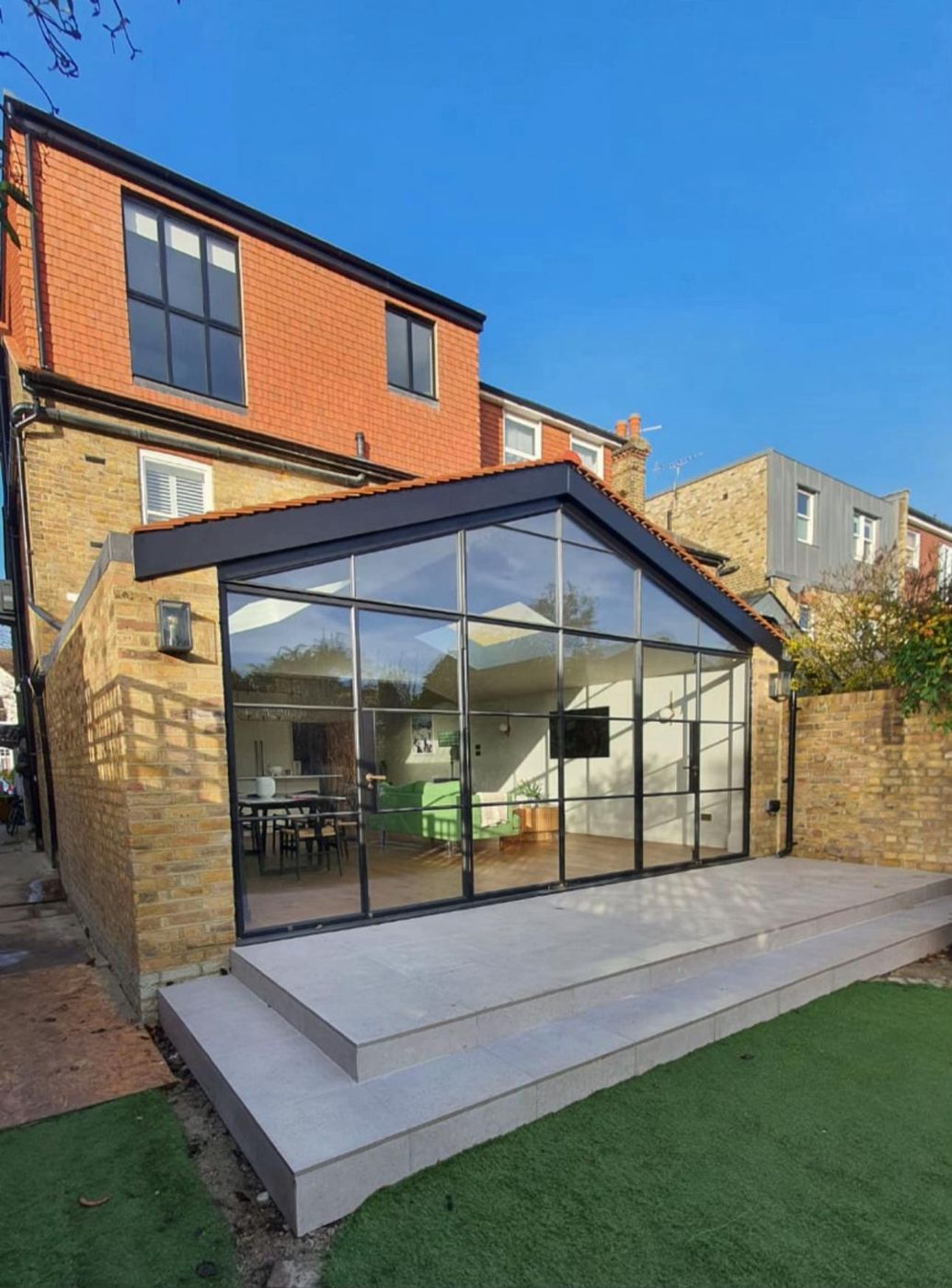 Finished glazed gable rear extension built by London Design and Construction