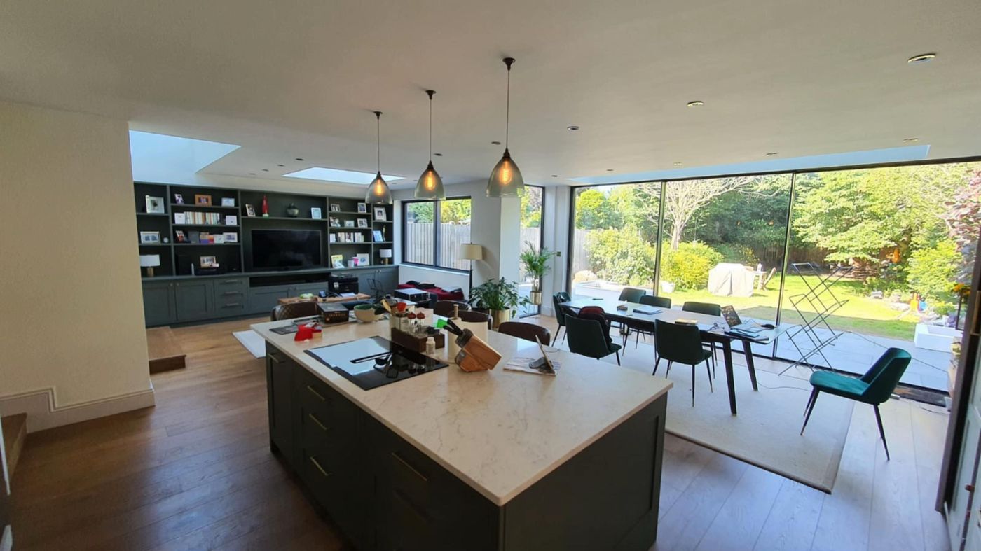 Open plan kitchen extension with full-width glazing onto the garden