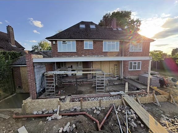 Extension structure and roof going on