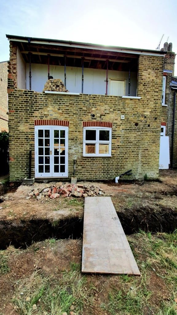 Rear of a London stock brick terrace before work